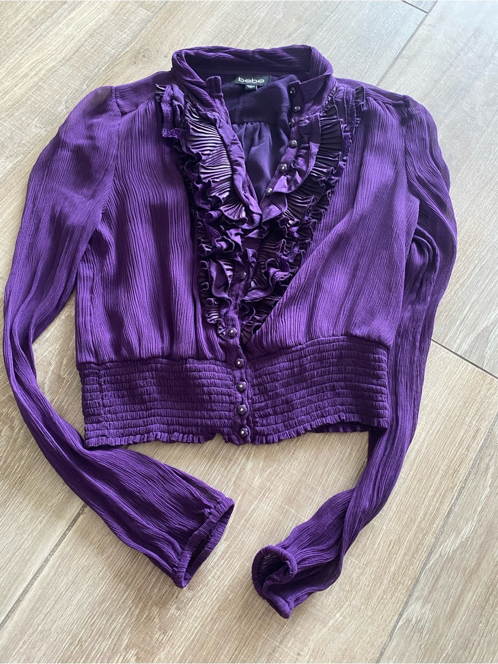 bebe Ruffled V-Neck Long Sleeve Blouse in Deep Purple